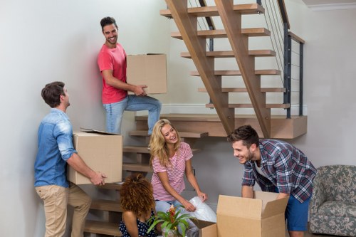 House movers loading a family home in Dagenham