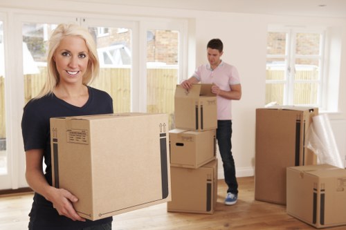 Furniture collection team handling bulky household items in Dagenham