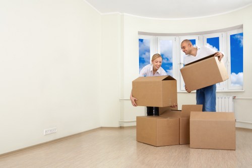 Careful wrapping and boxing of household items during a Dagenham move