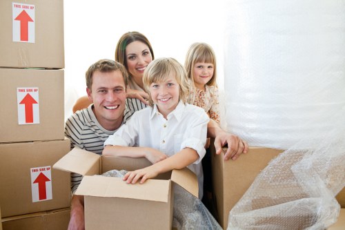Packed office equipment and furniture ready for relocation