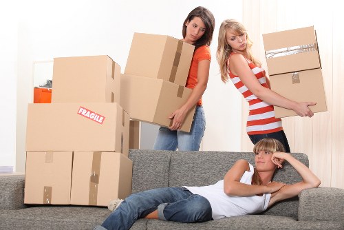 Packed boxes and furniture being loaded for a Dagenham relocation